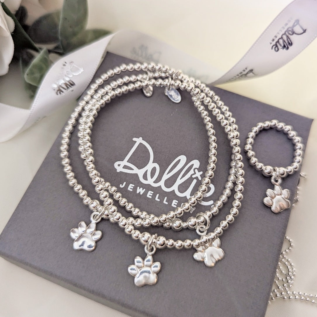 Dollie Paw Print Charm Silver Bracelet