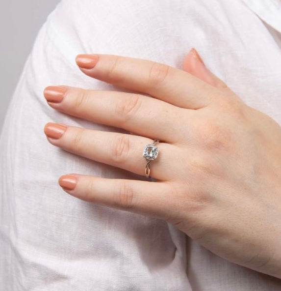 Aquamarine and Diamond Twist Design Ring in 9ct White Gold